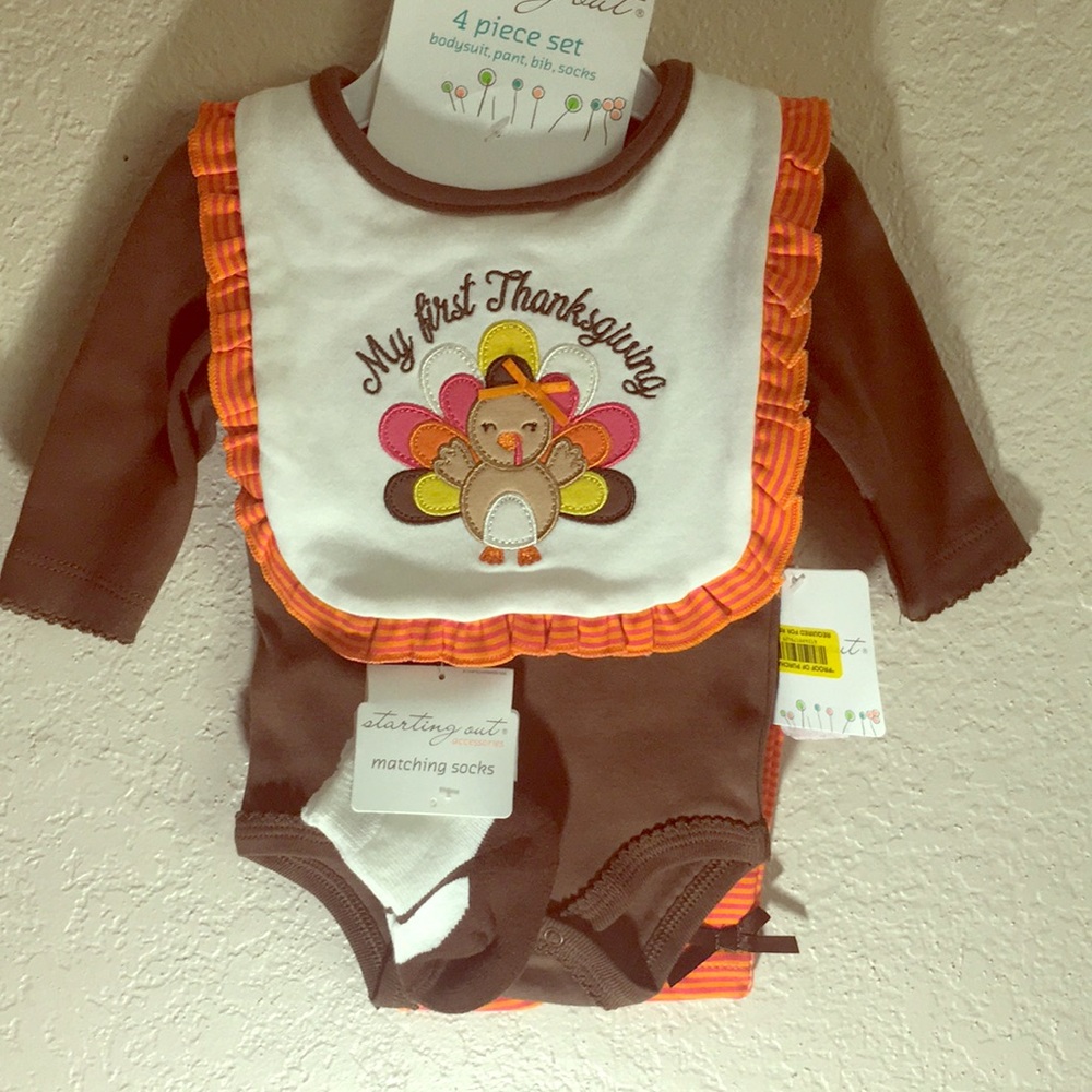 Brand New 4 piece New Born Body Suit